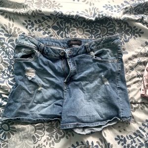 Blue wash jean shorts with rips
